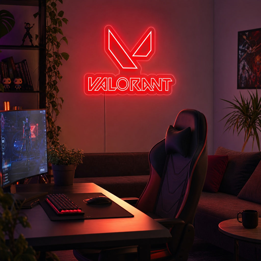 A 'Valorant' neon sign glowing red on a dark wall, as part of a modern gaming room setup.