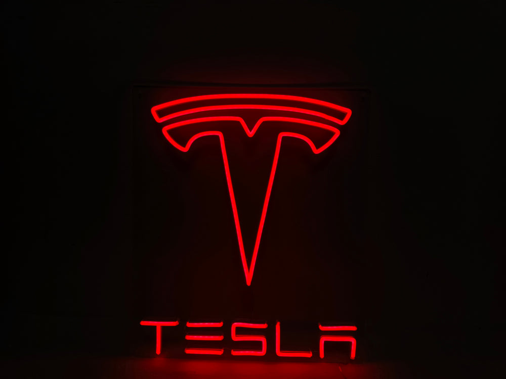 Finished Tesla logo neon sign glowing in red