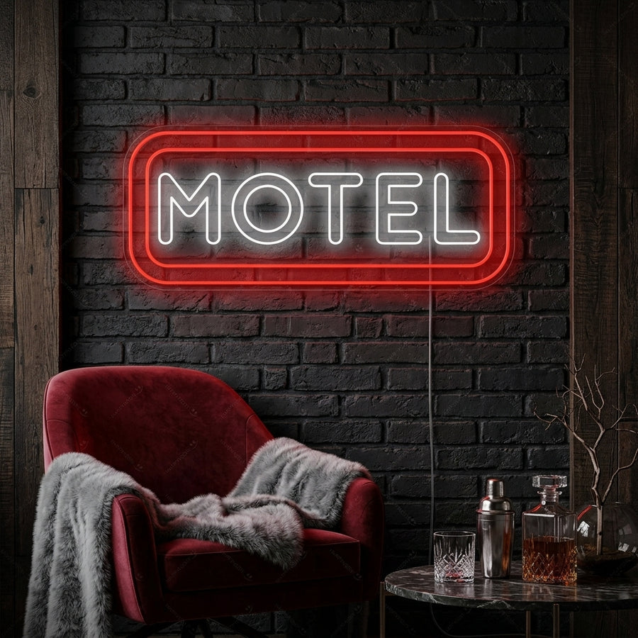 A vibrant orange-red Motel neon sign mounted on a stylized exposed brick wall in a retro-themed bedroom or lounge.