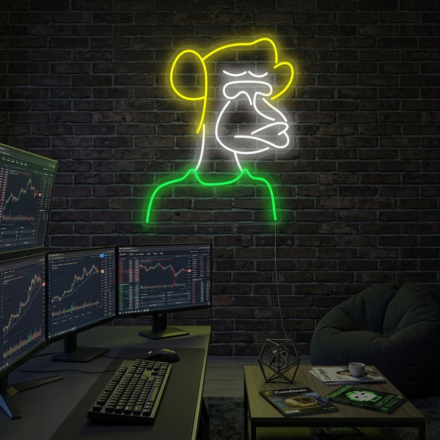 "Bored Ape" neon sign inspired by the popular Bored Ape Yacht Club NFT, showing the classic bored ape wearing a striped shirt and glasses, glowing in vibrant colors against a dark background.