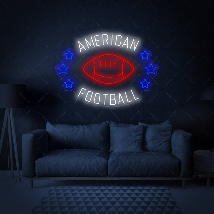 Close-up studio shot of an illuminated American Football neon sign on a clear acrylic backing, showcasing its vibrant orange and blue lines.