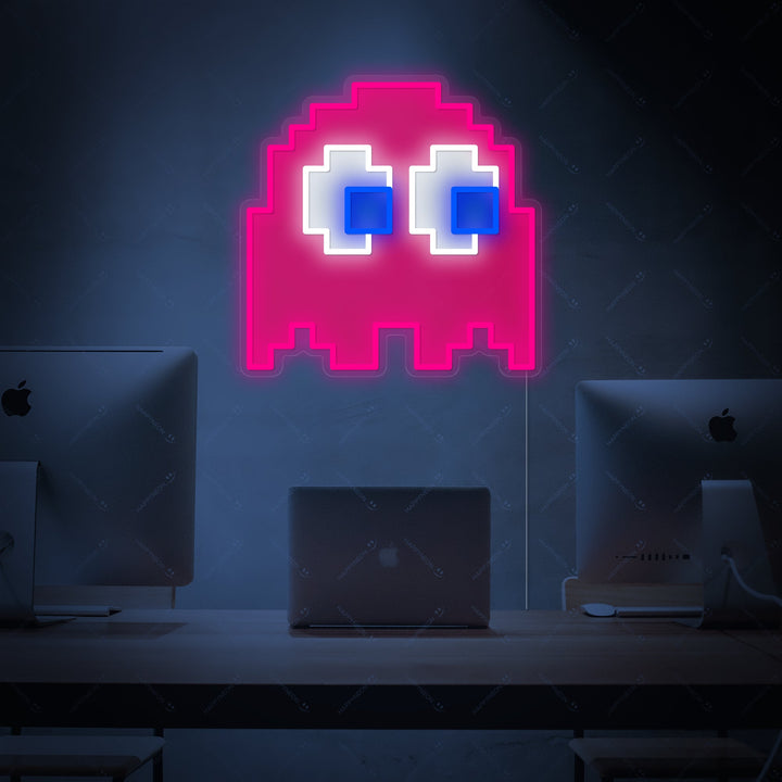 Product design mockup of the blue Arcade Ghost neon sign with a clear acrylic backplate shown against a light office background.