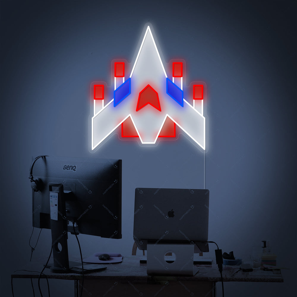 Detailed product shot of the illuminated Arcade Space Ship Neon Sign on a clear acrylic backing.