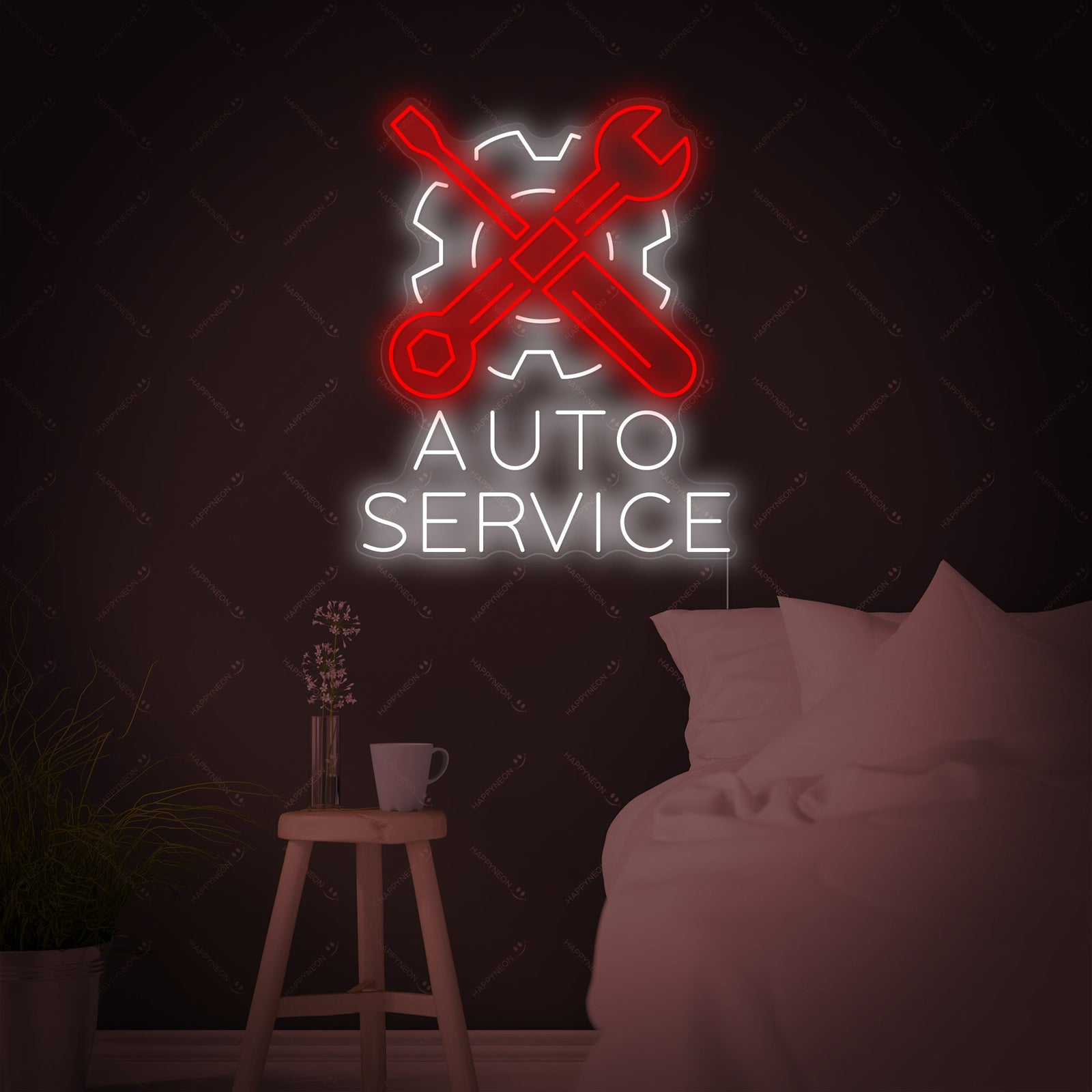 Vibrant blue and red Auto Service neon sign with a glowing outline and wrench detail, mounted on a plain wall.