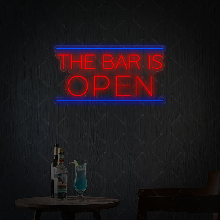 A polished mockup image showing the "Bar Is Open" neon sign with acrylic backing, mounted above dimly lit bar items.