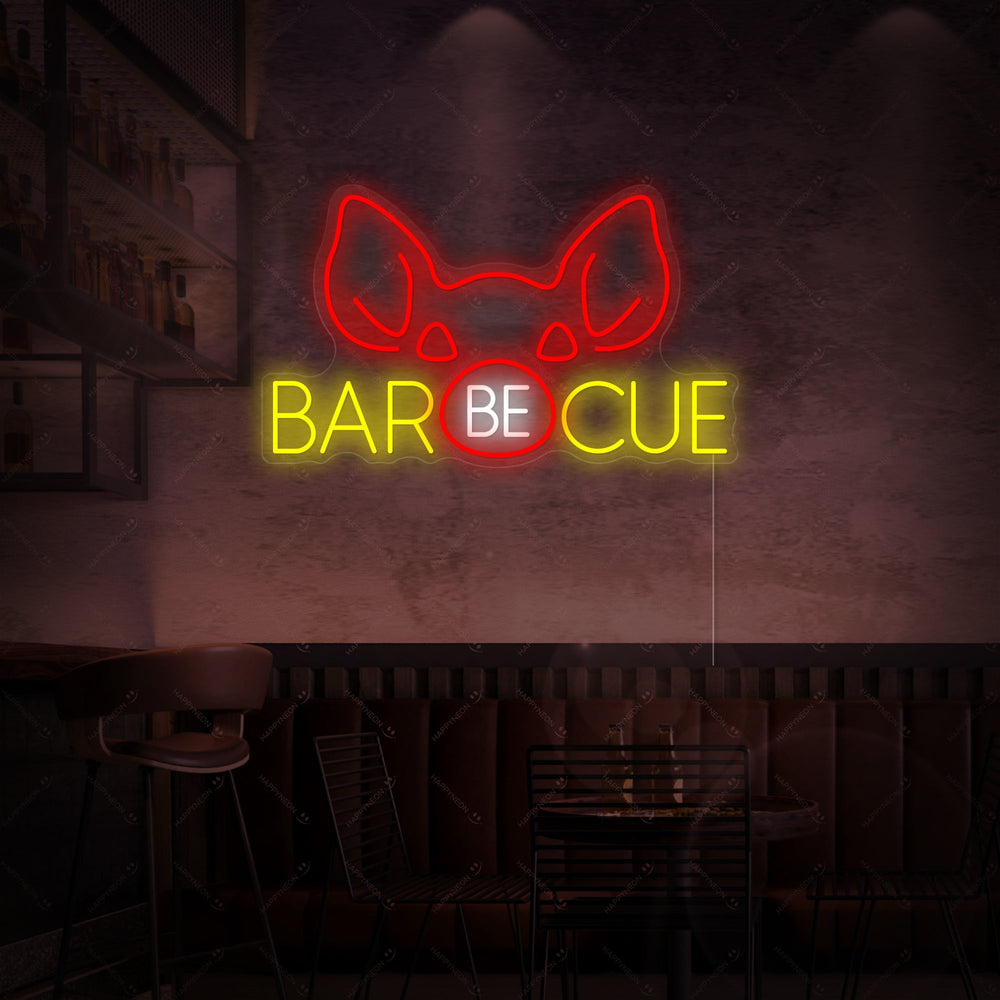 A detailed view of the illuminated 'Barbecue Pig' neon sign showing the pig silhouette and text.