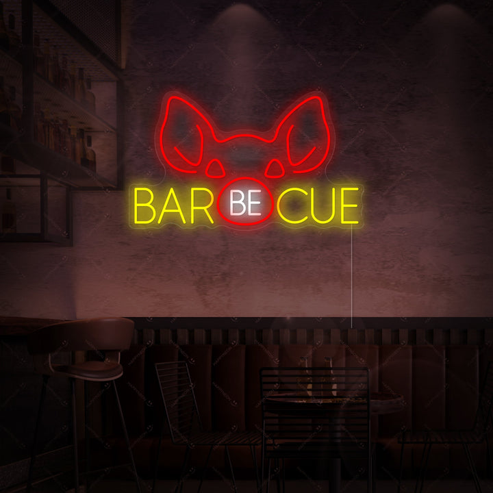 A detailed view of the illuminated 'Barbecue Pig' neon sign showing the pig silhouette and text.