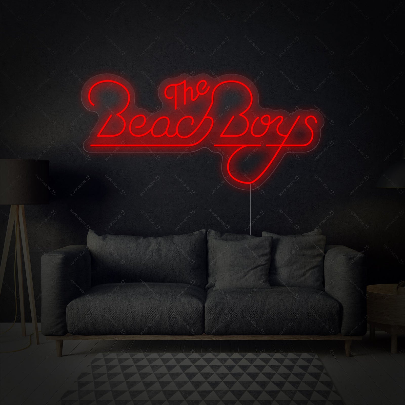 Close-up photograph of the 'Beach Boys' neon sign, highlighting the craftsmanship of the glowing letters and its clear mounting backboard.
