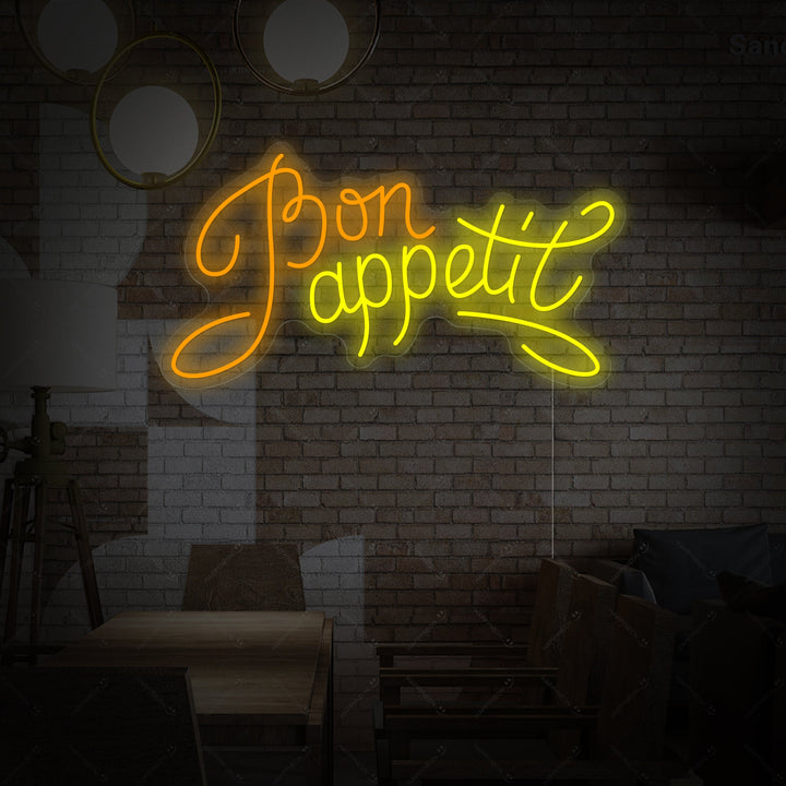 Detailed rendering of the 'Bon Appetit' neon sign, showing the red illuminated tubing forming the script words against a dark background, highlighting the sign's craftsmanship and shape.
