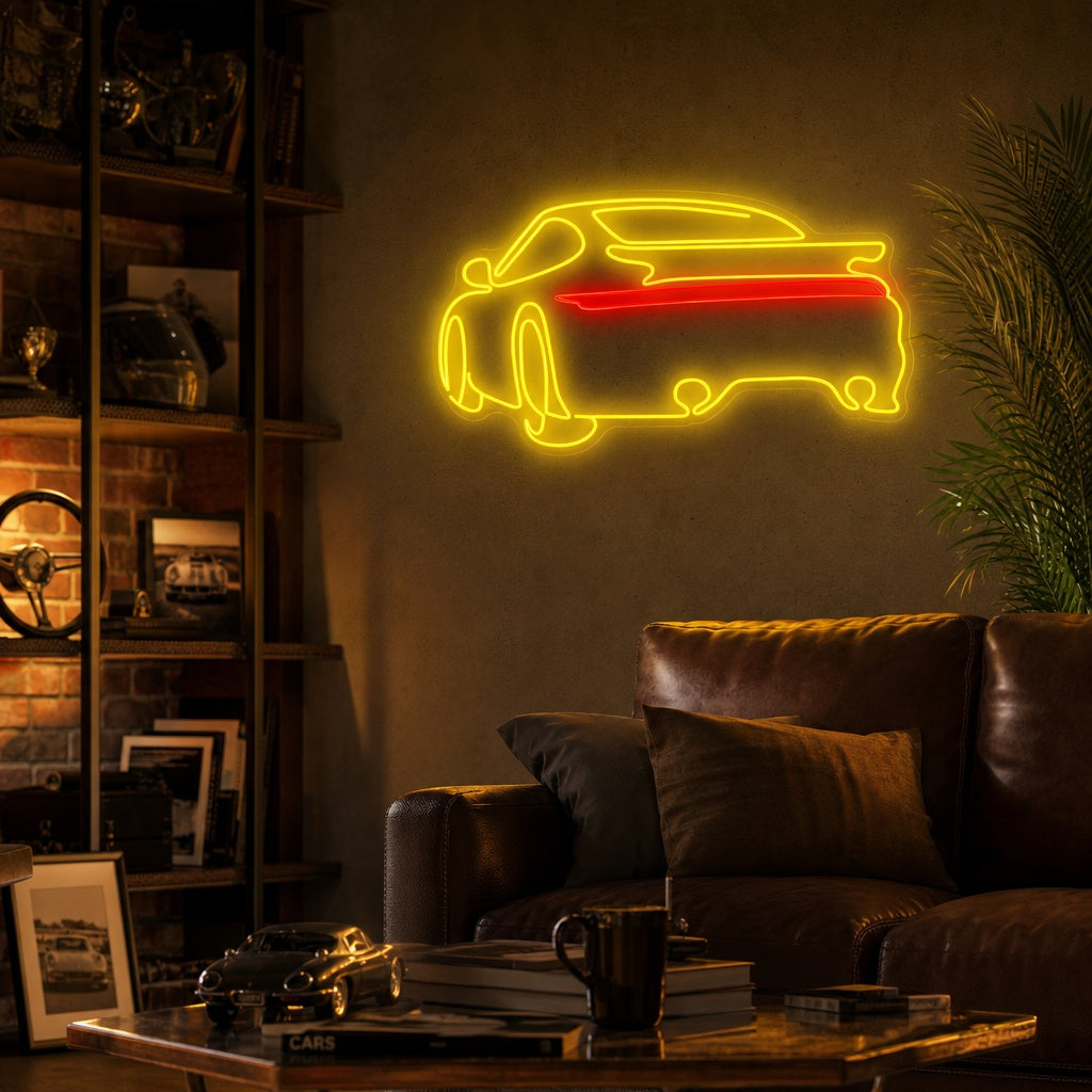 Vibrant yellow glowing neon sign in the shape of a classic Porsche 911 sports car, mounted on a brick wall in a modern garage interior mockup.