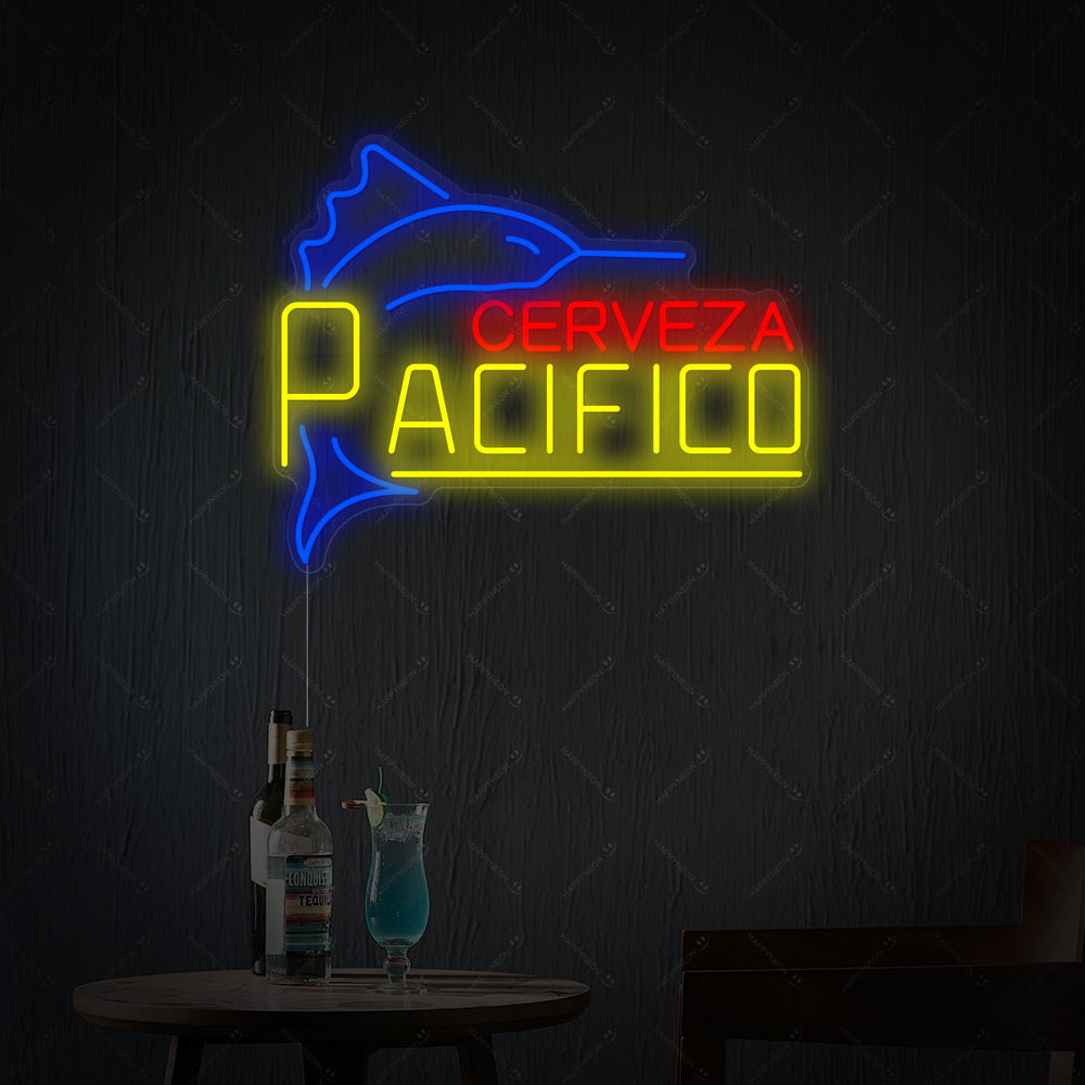 Detailed shot of the Cerveza Pacifico neon sign, showcasing the red 'Pacifico' text and blue anchor graphic on a clear backing.