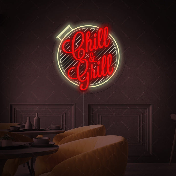 A illuminated 'Chill And Grill' neon sign featuring stylized spatula and tongs graphic elements against a dark background.