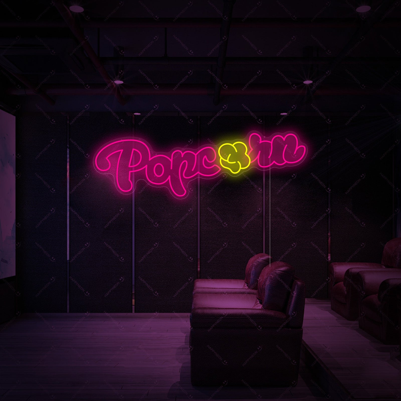 A brightly lit yellow and white neon wall sign in the shape of a classic movie theater popcorn container.
