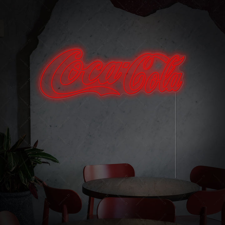 Close-up photograph of the handcrafted Coca Cola LED neon sign showing the distinct red and white color tubes and the clear acrylic mounting hardware.