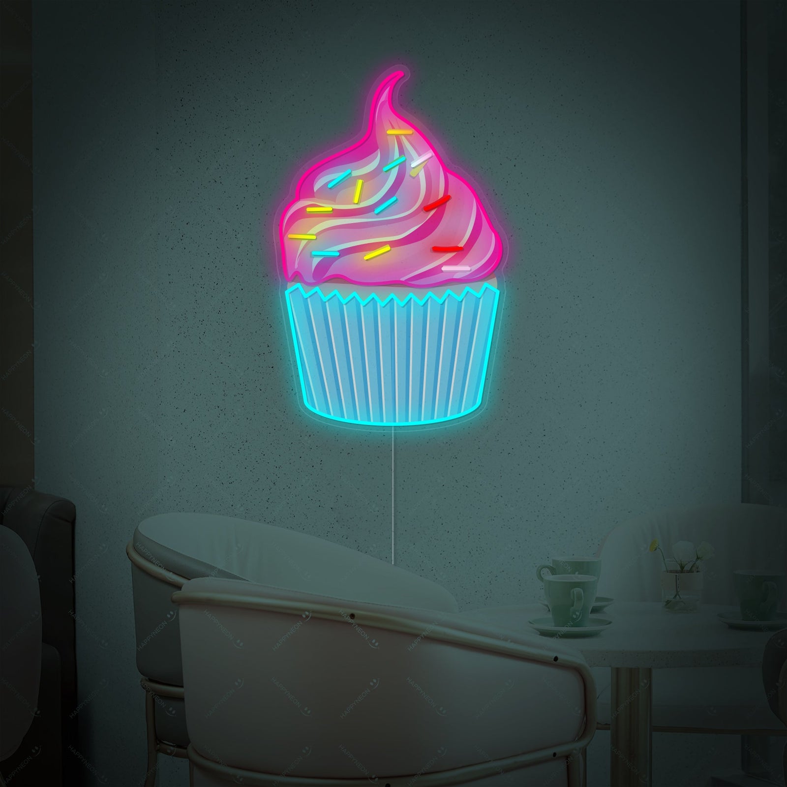Detailed shot of the 'Cupcake' neon sign featuring colorful graphic details and glowing neon outlines, showing the acrylic backing.