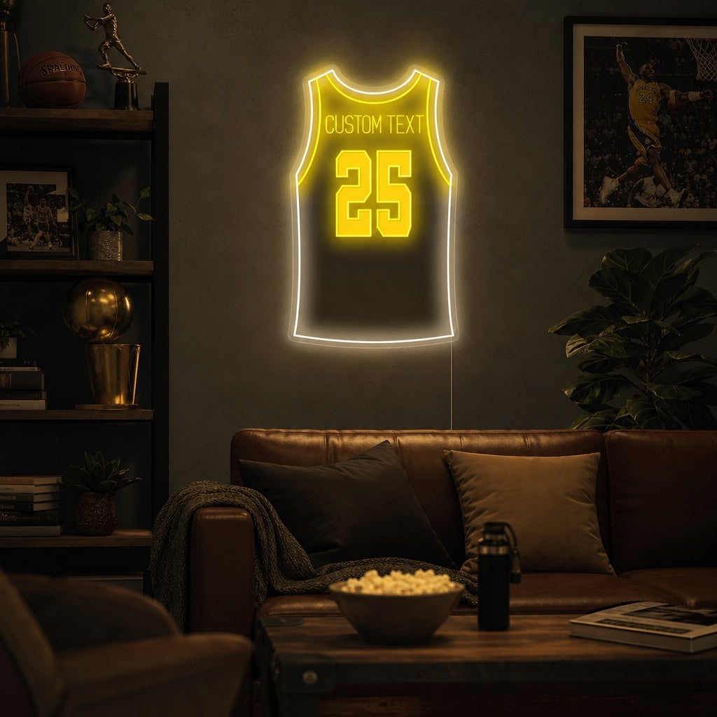 A personalized 'Custom Basketball Jersey' neon sign glowing brightly on a wall in a sports-themed room, showing the jersey design with a custom name and number.