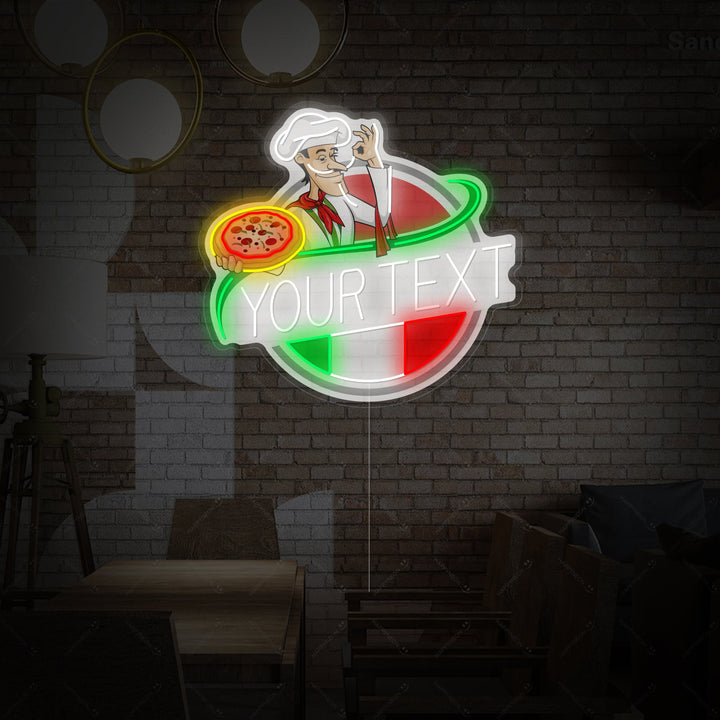 A colorful custom Italian restaurant logo featuring a cheerful chef with a mustache holding a pizza, displayed as a bright neon sign on a textured brick wall.