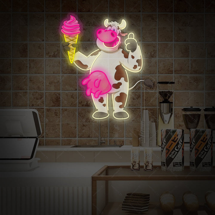 A detailed view of the 'Cute Cow With Ice Cream' neon sign, showing the combination of printed graphics and glowing neon tubes on an acrylic backing.