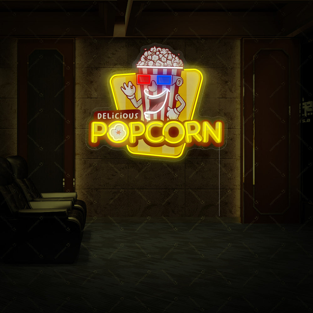 Close-up of the 'Delicious Popcorn' neon sign design, showing the detailed lettering and popcorn bucket graphic against a dark background.