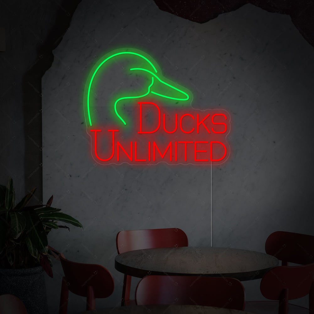 Ducks Unlimited neon sign featuring the official flying duck logo and text.