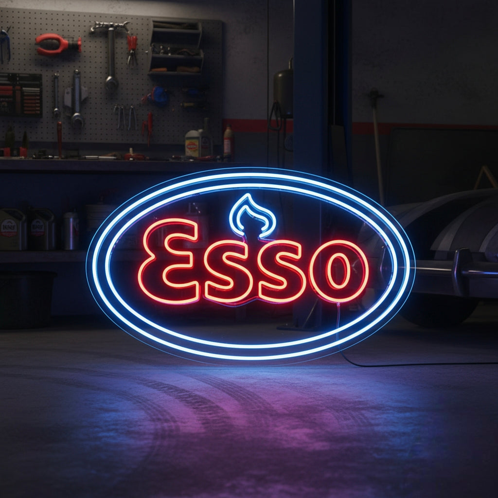 An Esso logo neon sign glows on the brick wall of a vintage garage setting, illuminating a classic motorcycle and work area.