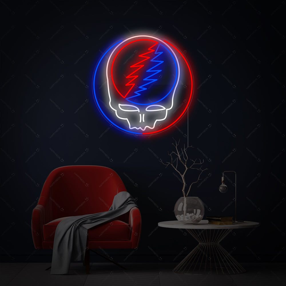 A close-up view of the detailed Grateful Dead neon sign design, showing the glowing blue skull and yellow-orange lightning bolt against a dark background.