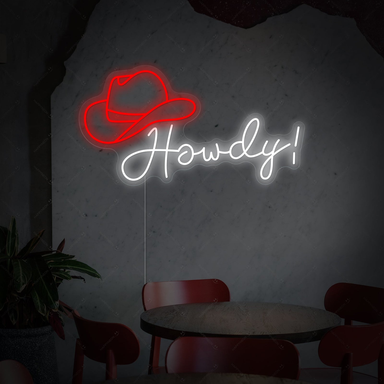 A cozy living room featuring the 'Howdy' neon sign with a glowing effect.