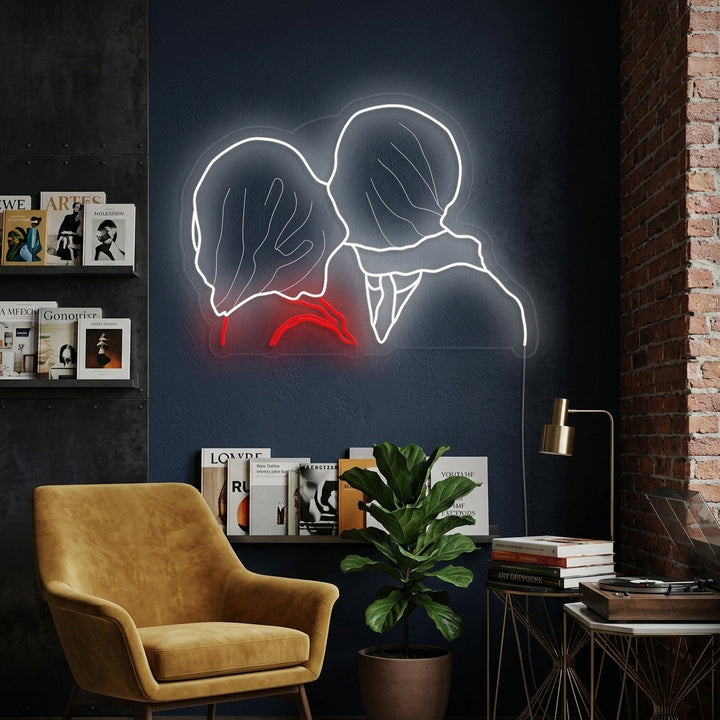 A close-up view of a vibrant neon sign rendering of René Magritte's 'The Lovers' artwork, casting a glow on a surrounding wall within an artistic interior setting.