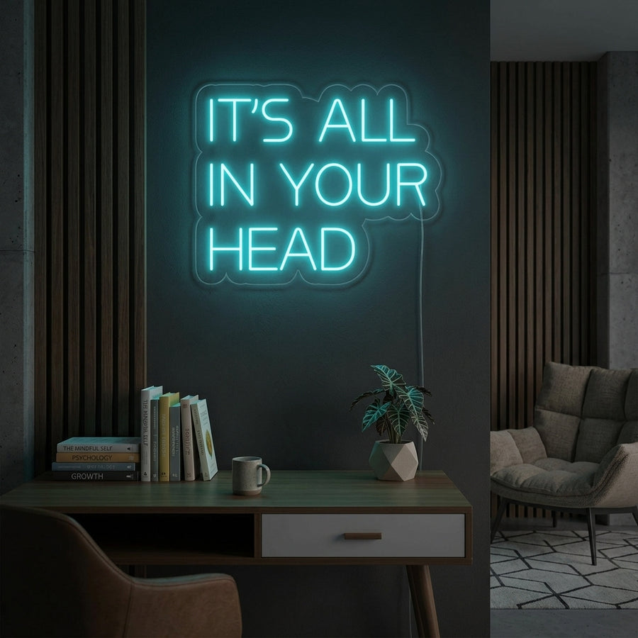 A stunning lifestyle image featuring the glowing 'Its All In Your Head' neon sign displayed on a modern wall.