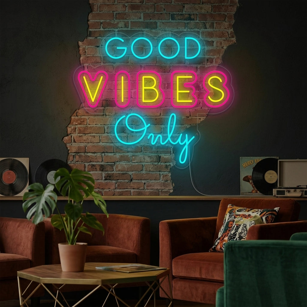 Lifestyle image of the Unique Good Vibes Only Neon Sign glowing in a cozy bedroom setting, above a decorated nightstand.