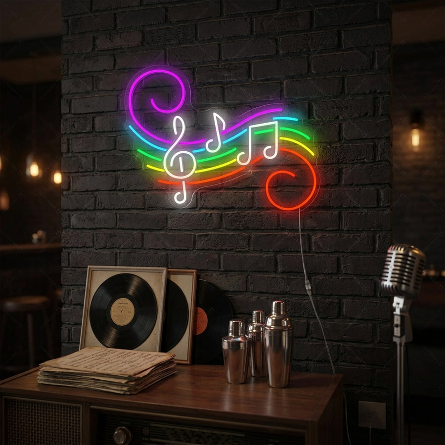A vibrant Music Notes neon sign glowing blue on a dark wall above a sofa and guitar in a modern room setting.