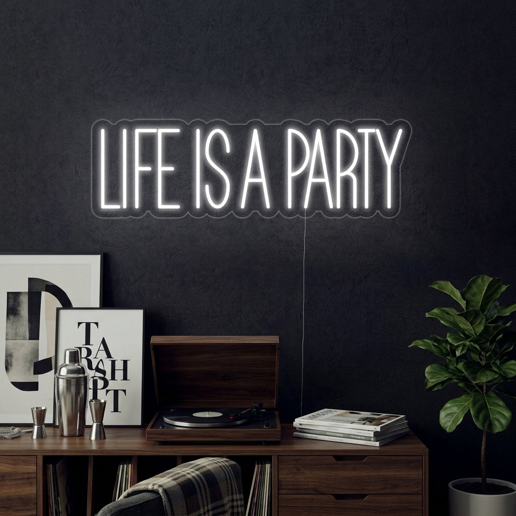 "Life is A Party" script neon sign glowing in a lively bar and lounge setting.