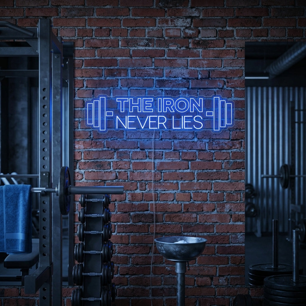 A fitness enthusiast sits in a home gym setting, looking motivated with the glowing 'The Iron Never Lies' neon sign displayed on a brick wall behind them.