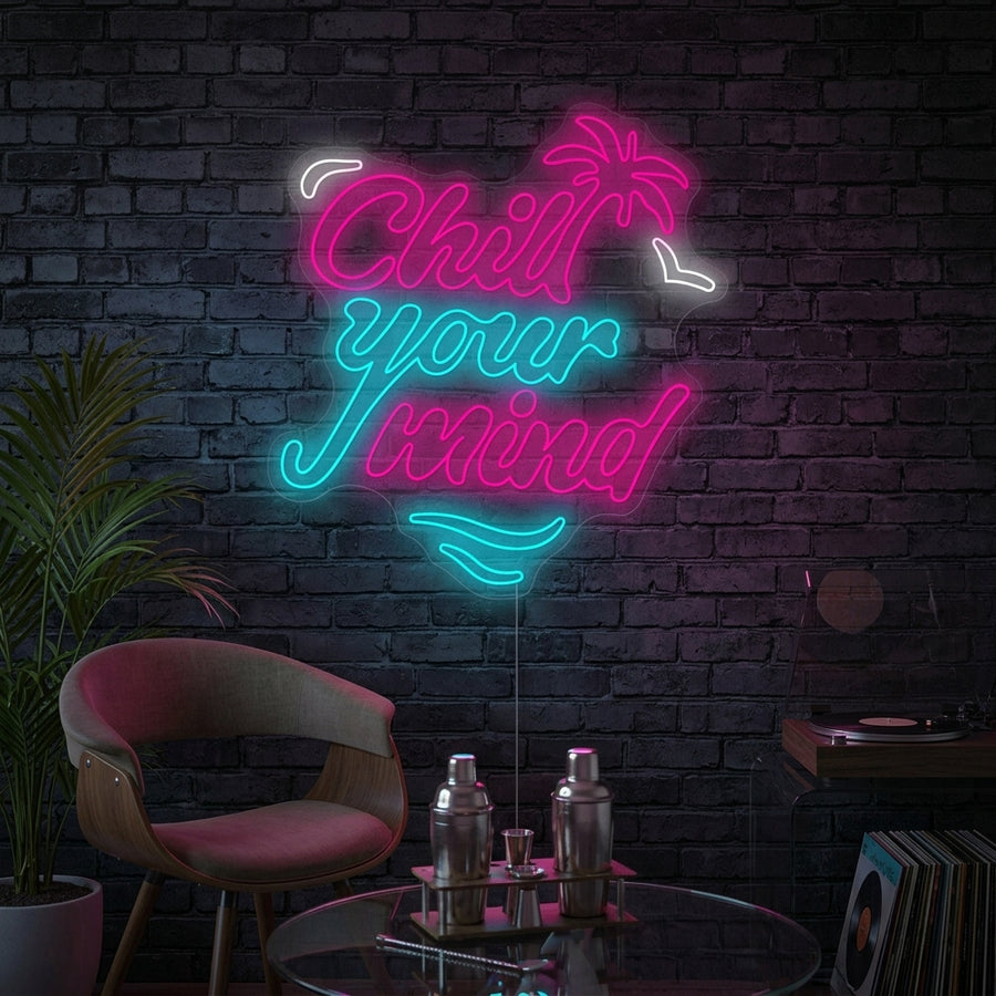 A vibrant 'Chill Your Mind' neon sign glowing on a textured wall in a modern living room setting.