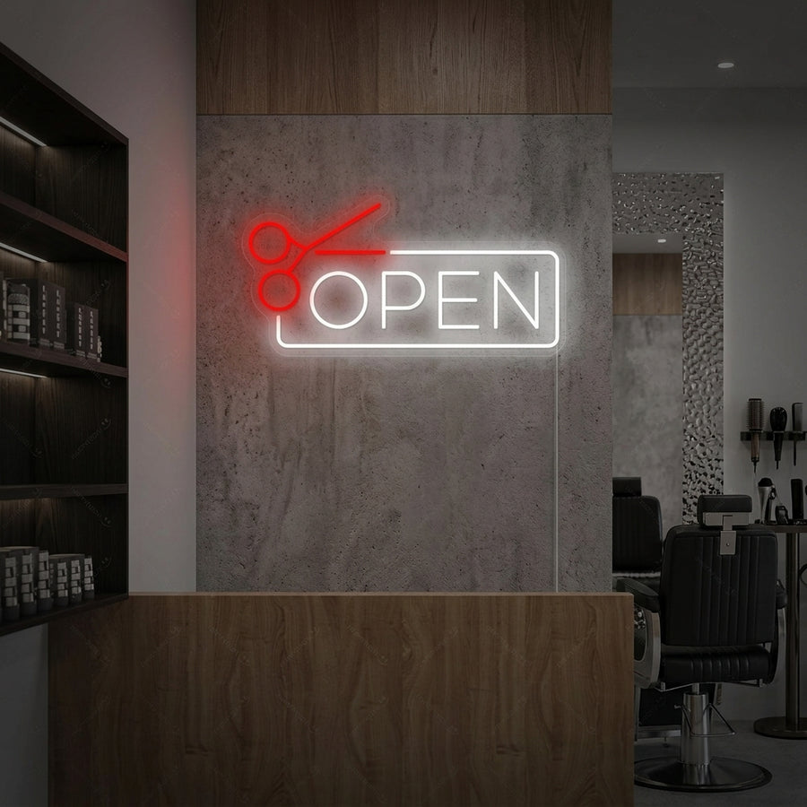 A glowing 'BARBERSHOP OPEN' neon sign hanging on a rustic brick wall inside a styled barbershop.