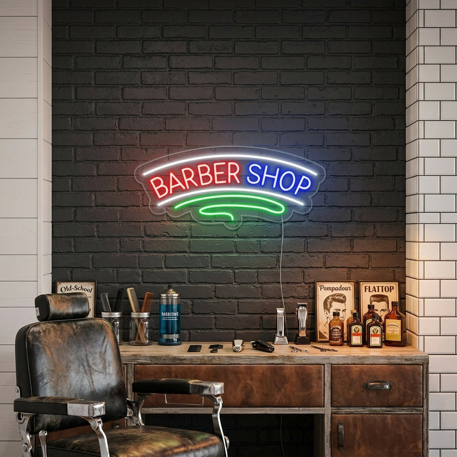 A "Barbershop" neon sign glowing brightly on a brick wall inside a bustling, retro-style barber shop with leather chairs and wooden stations.