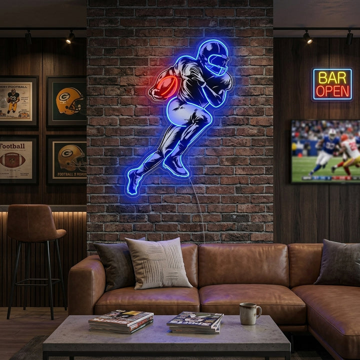 Vibrant blue and white American Football Player neon sign glowing brightly on a brick wall above a helmet and vintage football