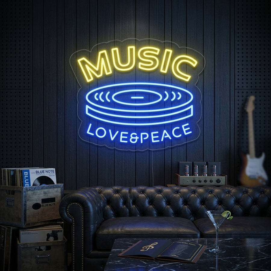 Vibrant MUSIC LOVE PEACE neon sign with heart, headphones, and peace sign, mounted on a living room wall.