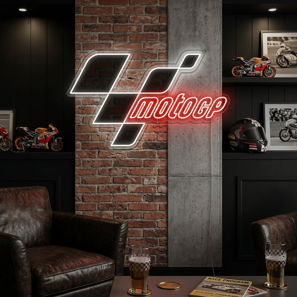A glowing MotoGP race logo neon sign mounted on a textured brick wall, illuminating a modern room with red and white light.