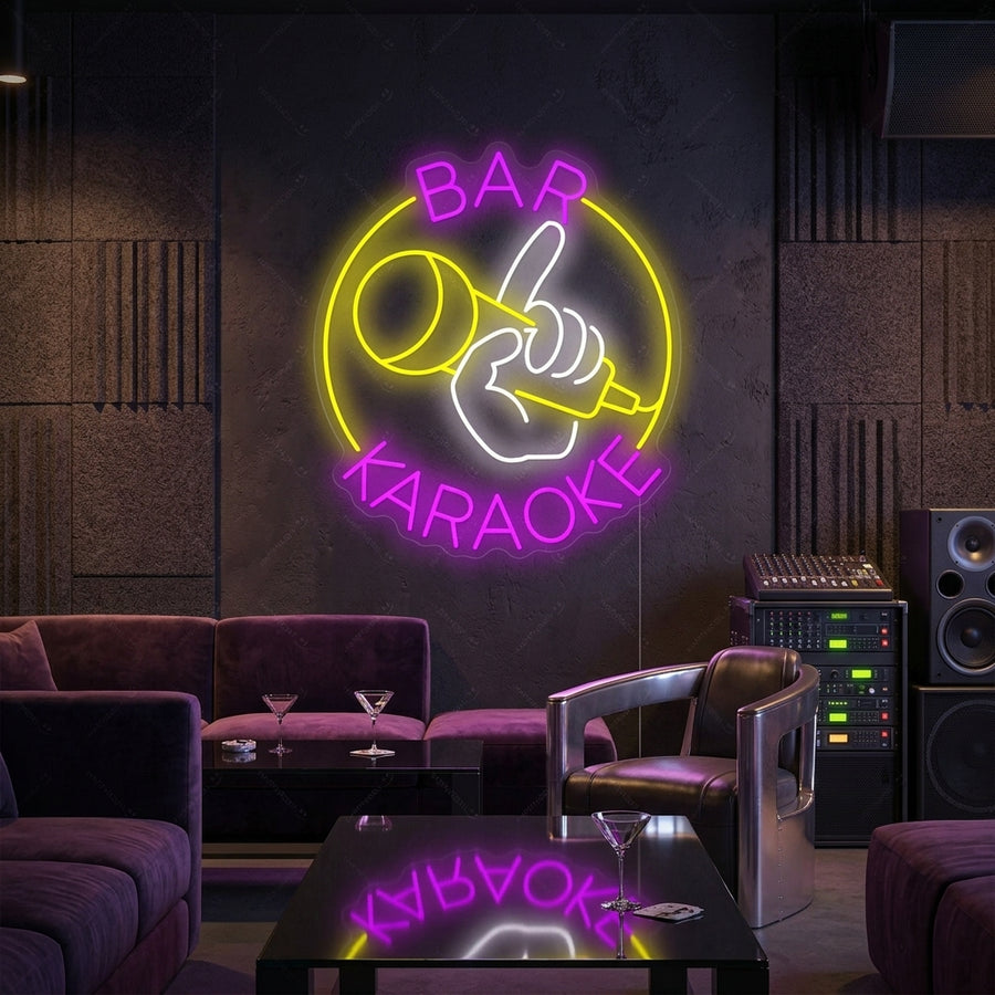 A vibrant 'Karaoke Bar' neon sign glowing on a dark wall above comfortable seating, creating a lively atmosphere.
