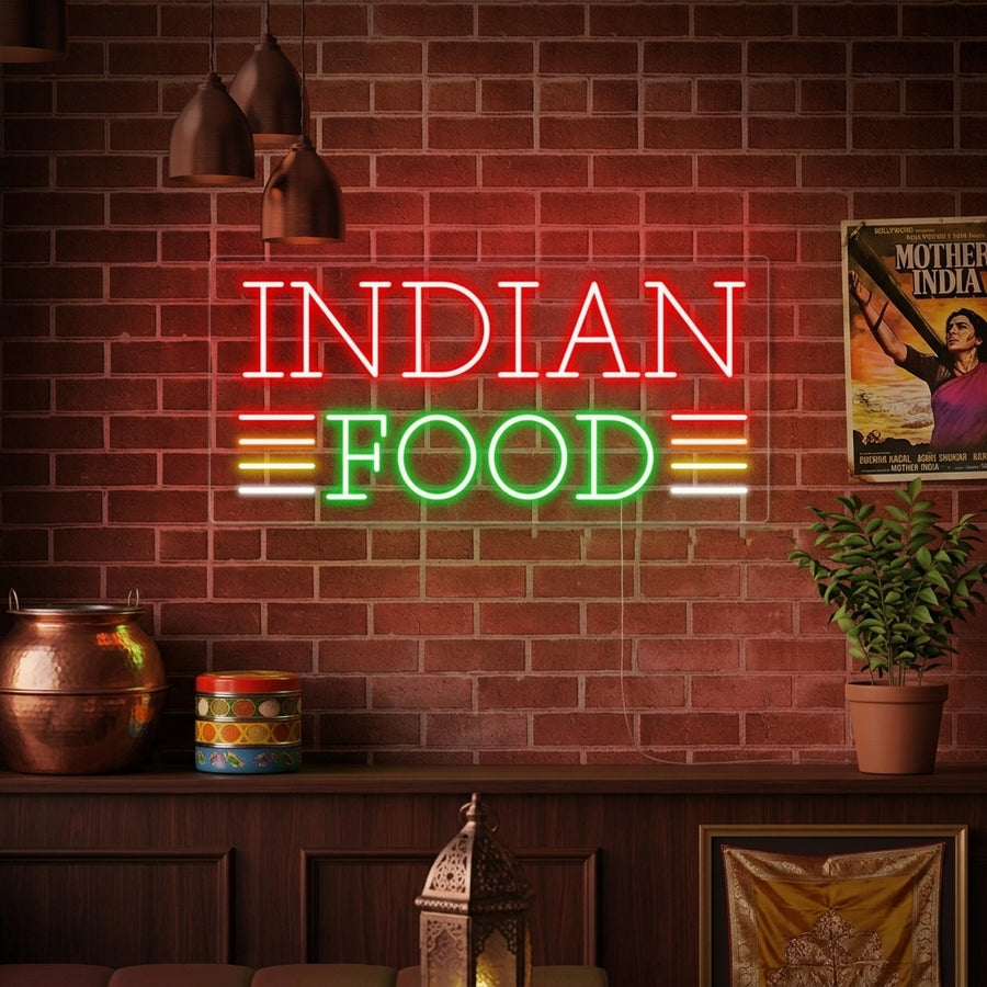 Vibrant "INDIAN FOOD" neon sign glowing warmly on a rustic brick wall inside a bustling restaurant, surrounded by traditional decor.