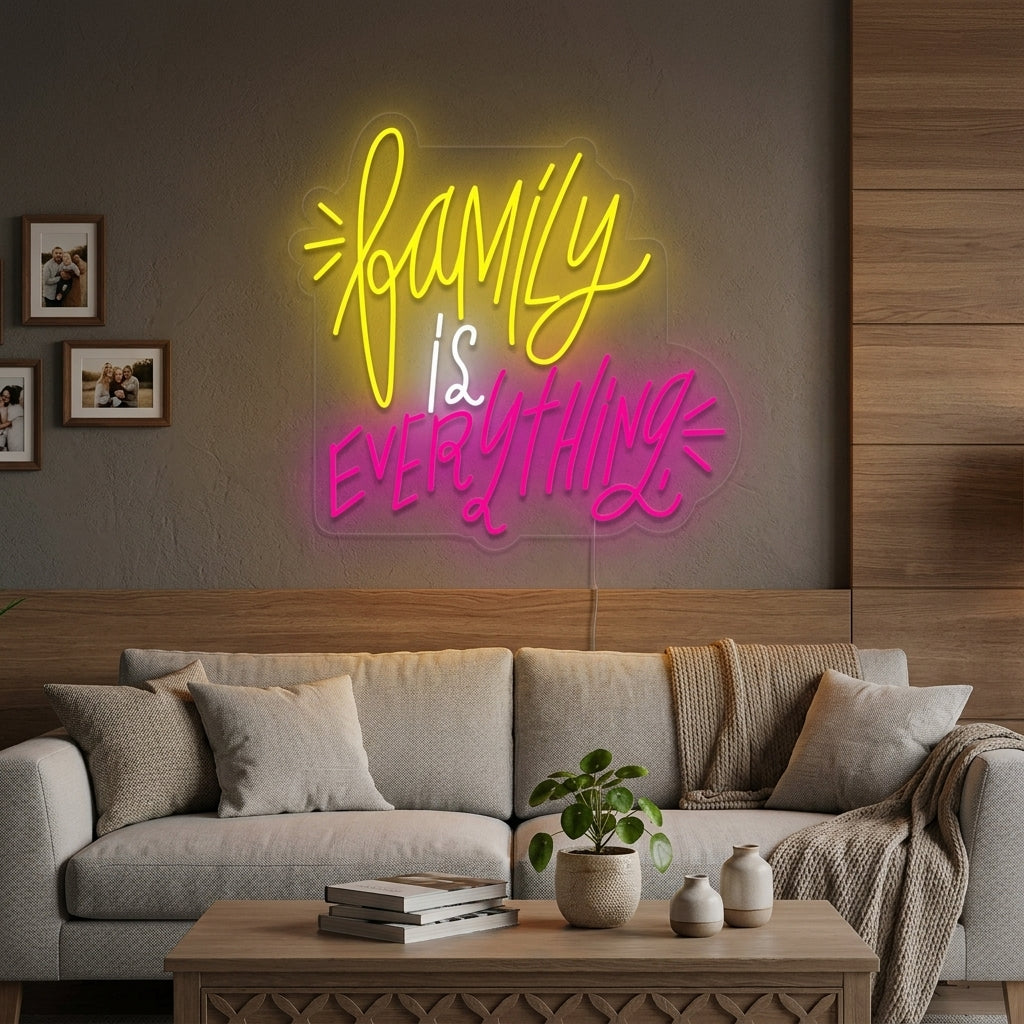 A cozy living room setting with the illuminated "Family is Everything" neon sign mounted above a textured sofa, surrounded by family photos.