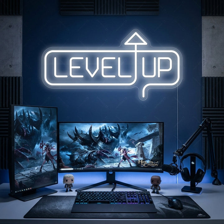 A glowing 'Level Up' neon sign mounted on a textured dark blue brick wall above a gaming desk with LED lights.