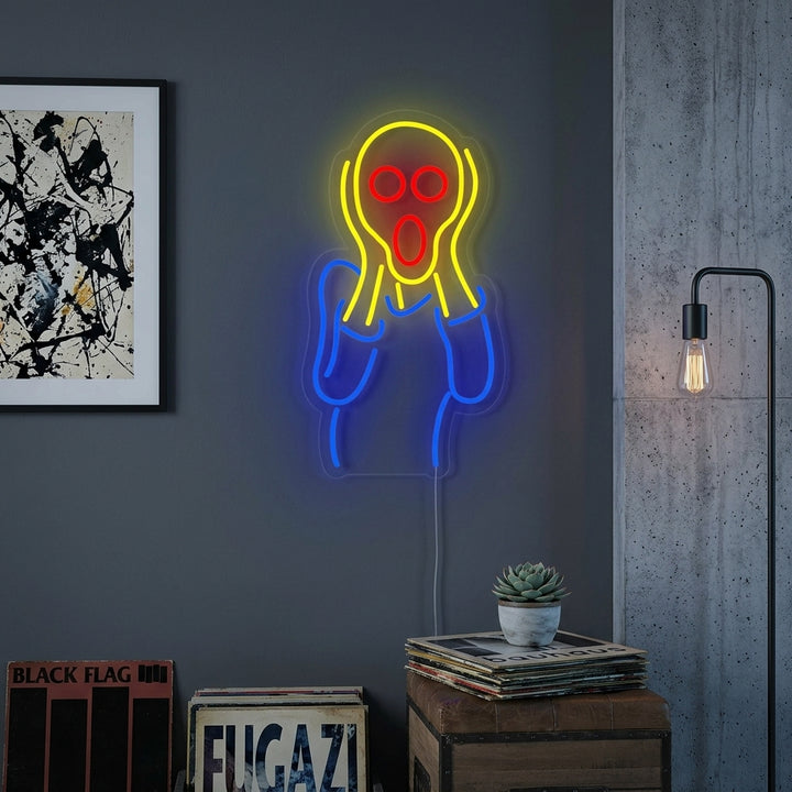 An illuminated neon sign depicting Edvard Munch's 'The Scream' mounted on a dark textured wall above a blue storage chest.