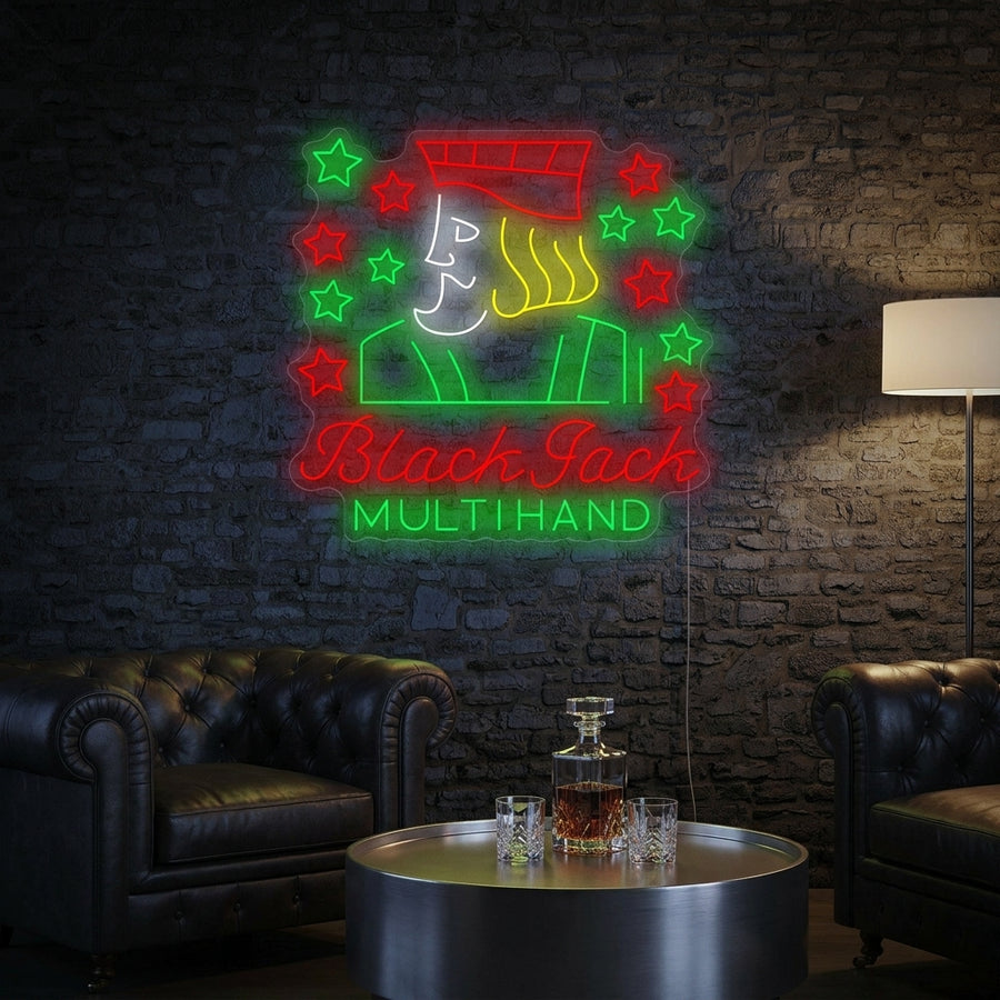 A lifestyle view of the Black Jack Multihand neon sign glowing brightly on a wall in a stylish home game room setting.