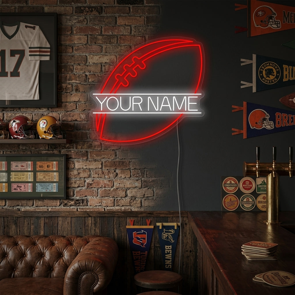 Custom American Football neon sign glowing orange and blue on a brick wall in a rustic game room setting.