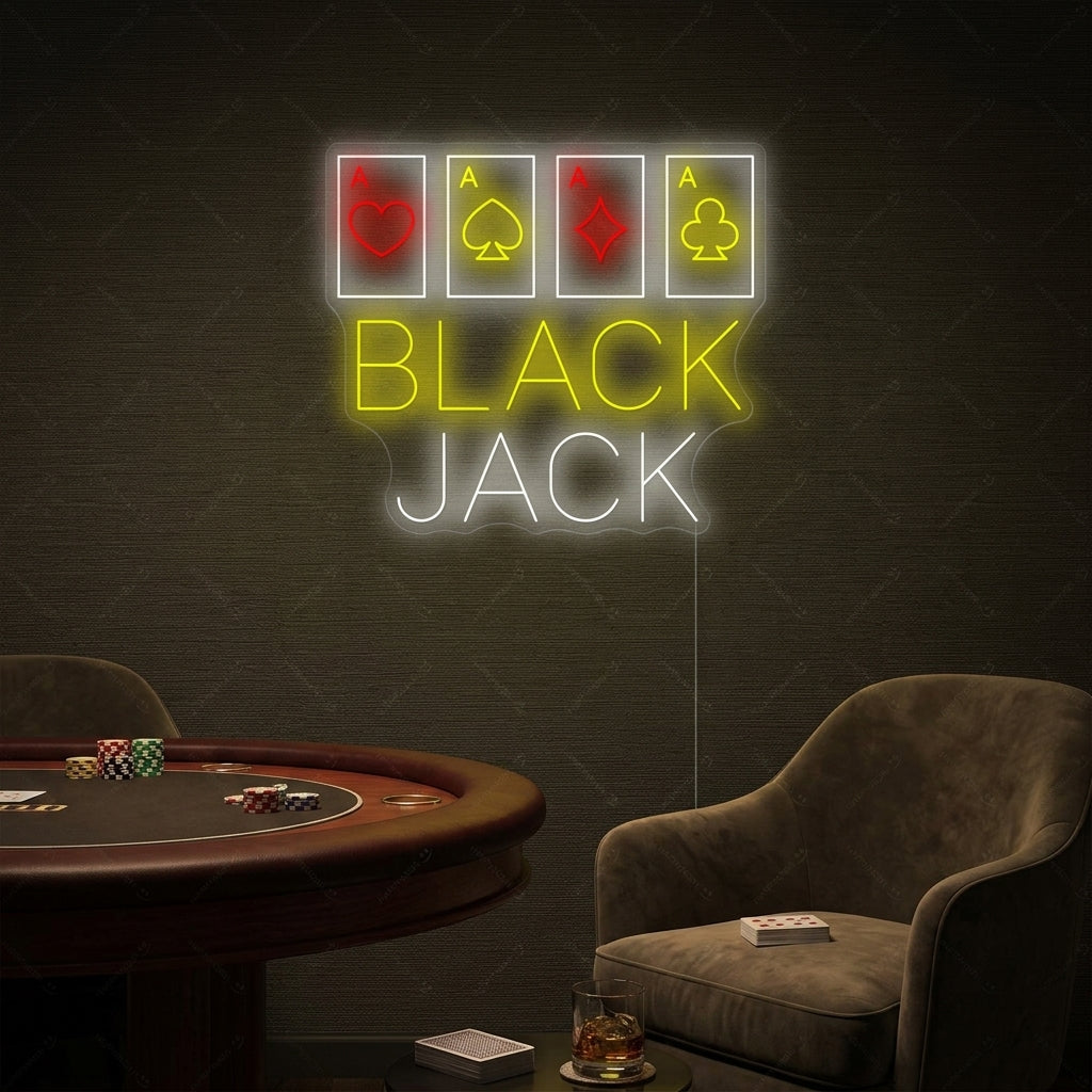 "Black Jack" neon sign with a glow on a dark wall above a sofa