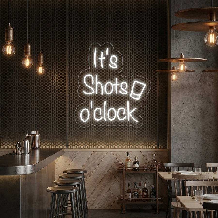 Vibrant blue 'its Shots oClock' neon sign glowing on a textured brick wall above a well-stocked bar, highlighting bottles and making a lively atmosphere.