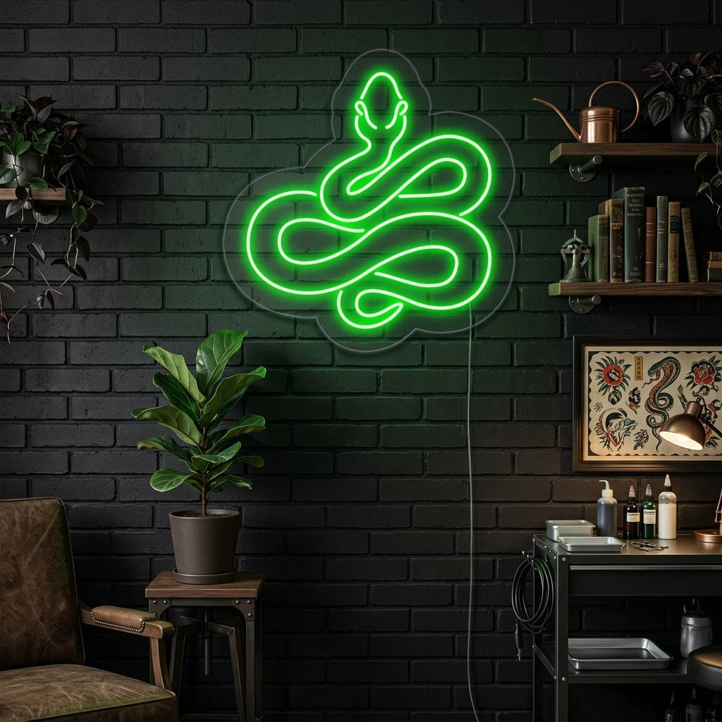 Striking 'Big Snake' neon sign glowing brightly with warm light, mounted on a textured dark wall in a stylish room setting.