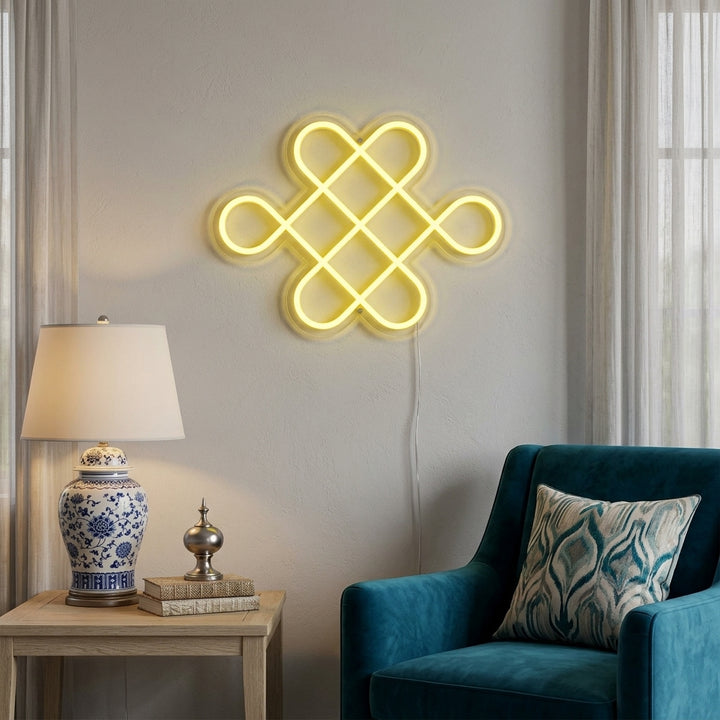 A lifestyle photo showing a traditional red and gold Chinese character emblem neon sign lit on a wall, complementing a stylish living room with an armchair and plant.
